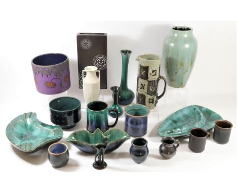 A collection of Canadian "Blue Mountain" pottery, Ontario pieces to include spill vases, jugs, bonbon dishes, tankards and bo