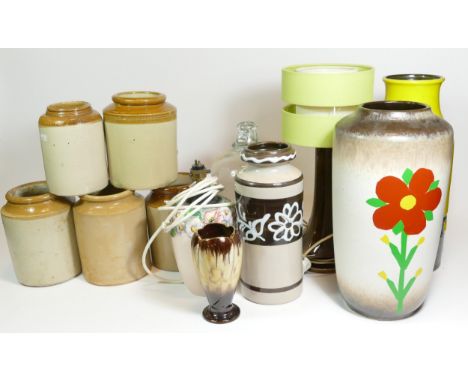 A collection of stoneware jars, together with early 20th Century meat platters, table lamps, ceramic vases, wall mirrors and 