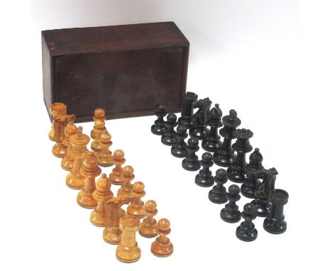 An Early XX Century Turned Wood Chess Set, king 8cm high, contained in a wooden box with sliding lid.