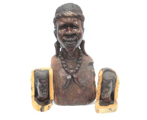 African Carved Hardwood Bust, with plated hair, bead and tusk necklace, naturalistic back base 45cm tall; a pair of Kenyan-ma