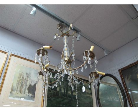 XX Century Gilded Brass, five branch chandelier with faceted glass drops