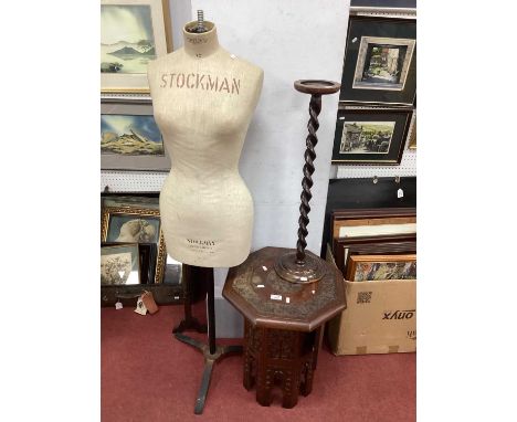 A Stockman Paris - London Display Dummy, on a metal tripod, wooden plant stand with barley twist neck and carved wooden table