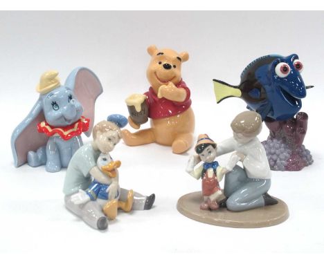Lladro Disney Collection Winnie the Pooh and Dumbo, Nao Collection Dory, boy playing with Pinocchio and Donald Duck, tallest 