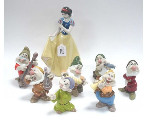 Nao Disney Collection Snow White and the Seven Dwarfs, Snow White signed 'Eva Cuewa' to base 26.5cm high. (8)All in good cond
