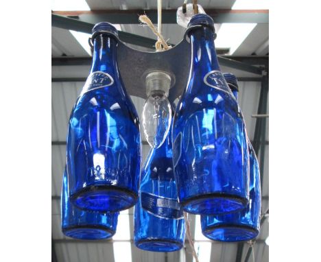 CEILING LIGHT PROTOTYPE, for kitchen with central light around five bottles of original TY-NANT water, 27cm H plus lead.
