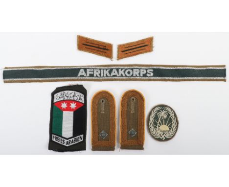 Grouping of German Afrikakorps (D.A.K) Insignia, including Afrikakorps cuff title, pair of yellow piped NCO’s tropical patter