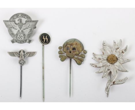 Third Reich Police 1942 Badge, in zinc metal with pin fitting to the reverse; mountain troops edelweiss badge with pin fittin