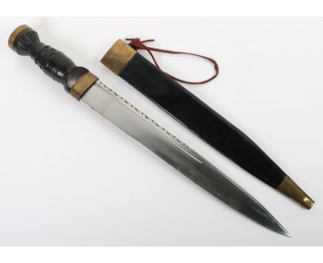 Copy of a Early Highlanders Scottish Dirk, with carved wooden grip and brass mounts. Housed in a leather scabbard. Standard d