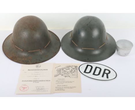 2x WW2 British Home Front Zuckerman Steel Helmets, both with the original blue paint finish. Both with leather liner systems.