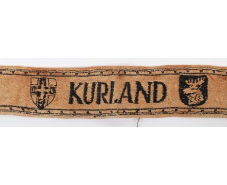WW2 German Kurland Cuff Title, crude machine embroidered example of the campaign cuff title awarded to German troops who serv