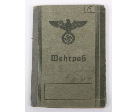 WW2 German Wehrpass to WW1 Veteran and Veteran of the Poland Campaign, good example with civilian photograph to the inside fr
