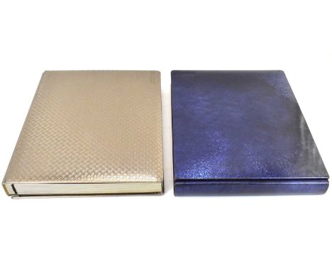 ACERBONI, ITALY; two large collectors' photograph albums, each with an artistic panelled leather-style front, each containing