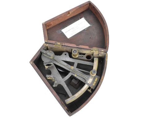 A late 19th/early 20th century sextant with lenses, with indistinct maker's mark, in wooden case, belonging to the late Capta