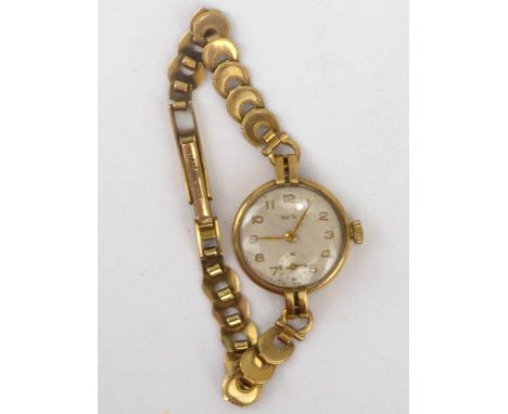 A ladies' vintage 9ct gold cased wristwatch, the silvered dial set with Arabic numerals, subsidiary seconds dial, crown wind 
