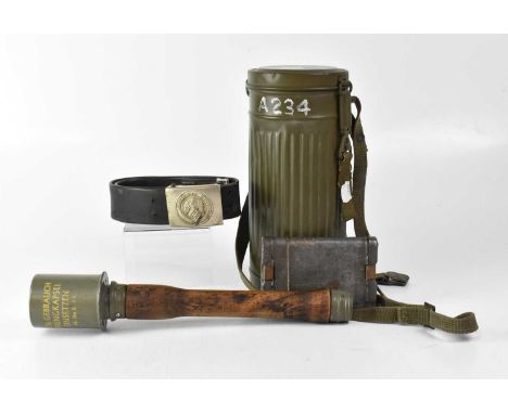 A WWII period German candlestick grenade inscribed 'VOR GEBRAUCH SPRENGKAPSEL EINSETZEN sk.Do II. 12.', also a cased gas mask