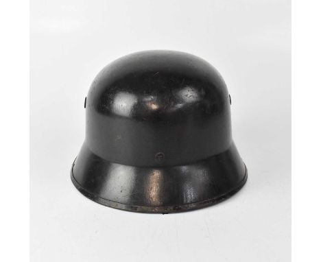 A WWII period Hitler Youth helmet with tan leather liner inscribed 'Robert Lubstin, Berlin No.55' (af).Condition Report: - Th