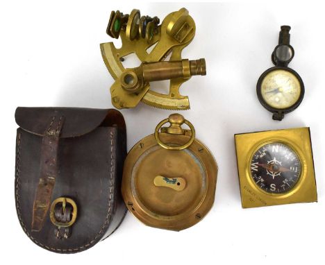 STANLEY; two compasses, one of square form, with black dial marked '1911', the other marked '1942', of heavy size, in leather