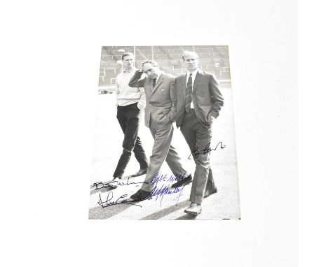 WORLD CUP 1966; a black and white press photograph, 'Man with problems', bearing signatures of Alf Ramsey, Bobby Charlton and