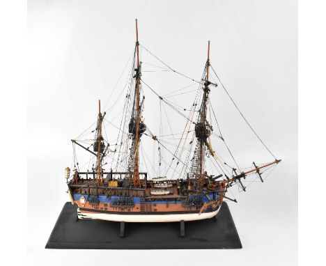 A scale model of a 17th century sailing ship, raised on black painted plinth, 66 x 81 x 27cm.