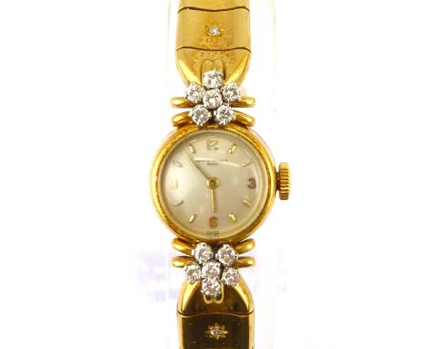 VACHERON CONSTANTIN; a ladies' 18ct gold diamond wristwatch, the circular dial set with numbers at 3, 6, 9 and 12 o'clock, an