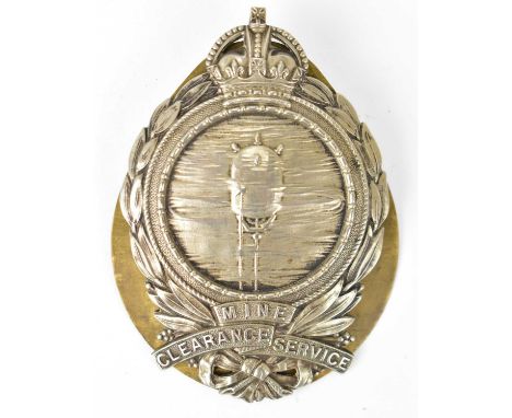 A Mine Clearance Service cuff badge, 8.5 x 5.5cm, with brass backing plate, awarded to D. A. Macleod K6317 Stoker First Class