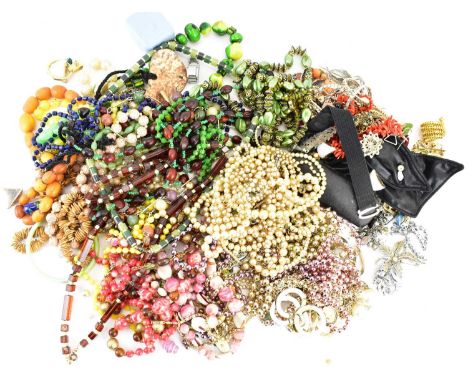 A quantity of mixed vintage and modern costume jewellery.