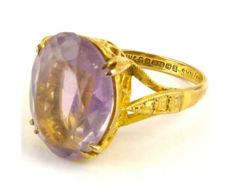 A 9ct gold amethyst dress ring, the claw set cut oval amethyst on basket cage head, size L, approx. 3.7g.