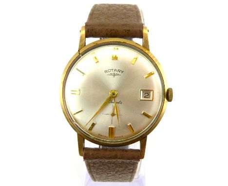 ROTARY; a gentlemen's 9ct gold wristwatch, the silvered dial set with gold baton numerals, calendar window at 3 o'clock and s