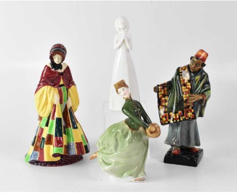 ROYAL DOULTON; four figures comprising HN564 'The Parson's Daughter', HN1464 'The Carpet Seller', HN3400 'God Bless You' and 