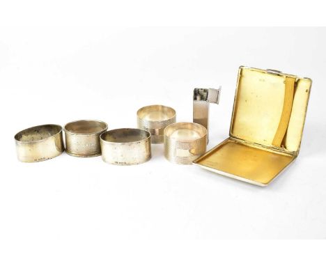 A small mixed lot of hallmarked silver to include a cigarette case with engine turned decoration, two pairs of napkin rings a