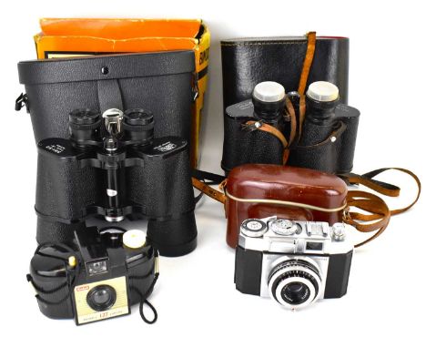 A pair of Mark Scheffel cased and boxed binoculars 35x50 ZCF, a pair of Tokutan Galilean 7x50 binoculars with coated lens, in