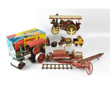 A collection of model steam engines to include a boxed Wilesco 'Old Smoky' steam roller, a plastic model of a Tom Varley stea