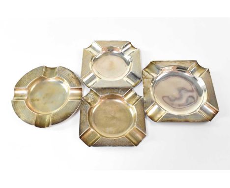 A pair of hallmarked silver square ashtrays with engine turned decoration, a similarly decorated, slightly larger example and