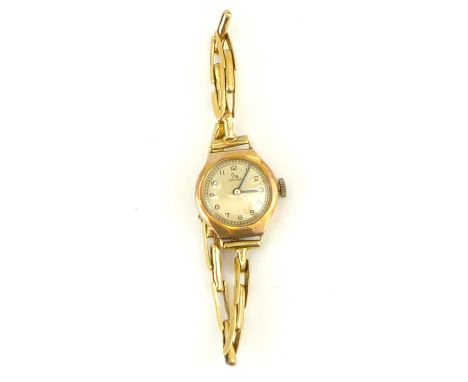 RECORD; a ladies' vintage 9ct gold wristwatch, the white enamelled dial set with Arabic numerals, crown wind movement, on a 9
