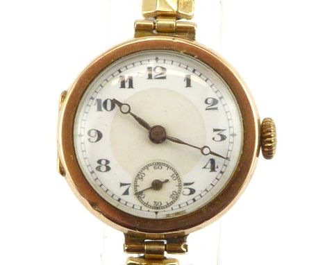 A vintage 9ct gold wristwatch, the white enamelled dial set with Arabic numerals and smaller subsidiary seconds dial, crown w