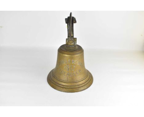 A brass bell from the trawler S.T. Agnes H. Weatherly, dated 1917 Aberdeen, with brass bracket, height of bell 24cm, to top o