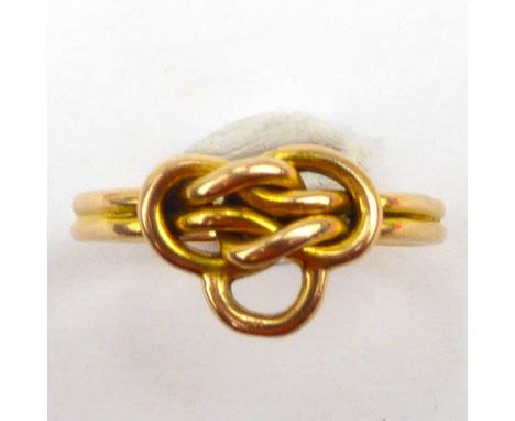 A 9ct gold puzzle ring, size K, approx. 2.4g.