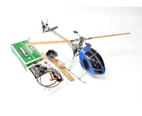 A large scratch-built RC helicopter with an MFA Bluebird engine, together with a Futaba controller, height 40cm.
