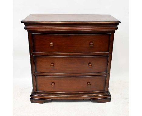 A contemporary bow-fronted chest of three long drawers, raised on bracket feet, 103 x 105 x 51cm.