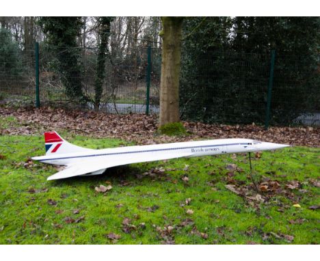 A large approximately 1:24 scale static model of Concorde, constructed in card to a good standard, finished in British Airway