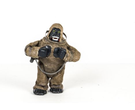 A Louis Marx Toys (Japan) Mechanical Gorilla, tinplate and plastic construction, fixed key clockwork motor, fur covering, met