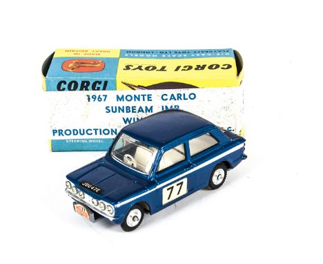 A Corgi Toys 340 Sunbeam Imp In Monte Carlo Trim, metallic blue body, white interior, RN77, spun hubs, in original 328 box wi