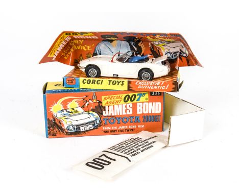 A Corgi Toys 336 James Bond's Toyota 2000 GT, white body, red aerial, 2 figures, rocket launchers in boot, in original box wi