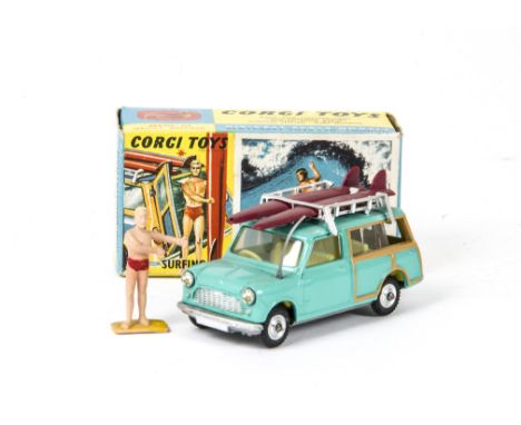 A Corgi Toys 485 BMC Mini Countryman with Surfer, sea-green body, lemon interior, two surfboards, male surfer figure, spun hu