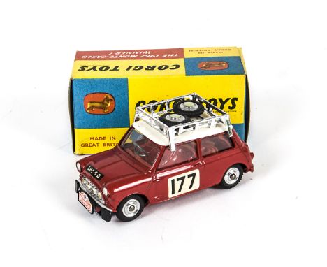 A Corgi Toys 339 Monte-Carlo B.M.C Mini Cooper S, red body and interior, white roof, RN177, 2 spare wheels on roof rack, spun