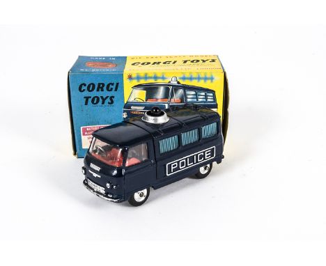 A Corgi Toys 464 Commer Police Van, dark blue body, open windows, blue roof light, white 'Police' cast into sides, in origina