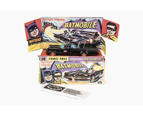 A Corgi Toys 267 Batman's Batmobile, gloss black body, 'Bat' logo hubs, Batman &amp; Robin figures, in original box with disp