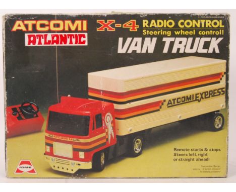 An original vintage Atcomi Atlantic X-4 radio control van truck. Appears complete &amp; within its original box. &nbsp;