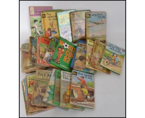 An extensive collection of vintage Ladybird children's book, various title and subjects all contained within a vintage suitca