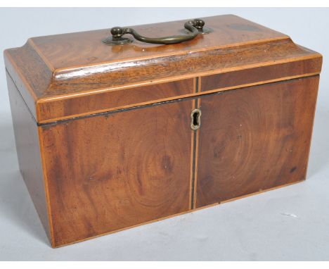 A George III mahogany rectangular section tea caddy with ebony and satinwood banding, the hinged top with brass swing handle,